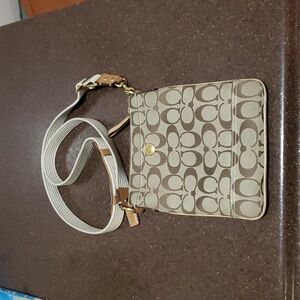 *COACH Logo Signature Crossbody Bag.  A0723-10250